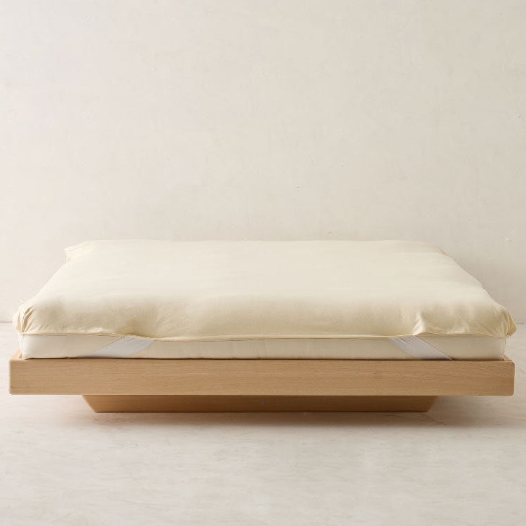 Non-toxic mattress protector — MoistureGuard waterproof barrier, breathable, preserves PureTal latex, SnoozeLift ready